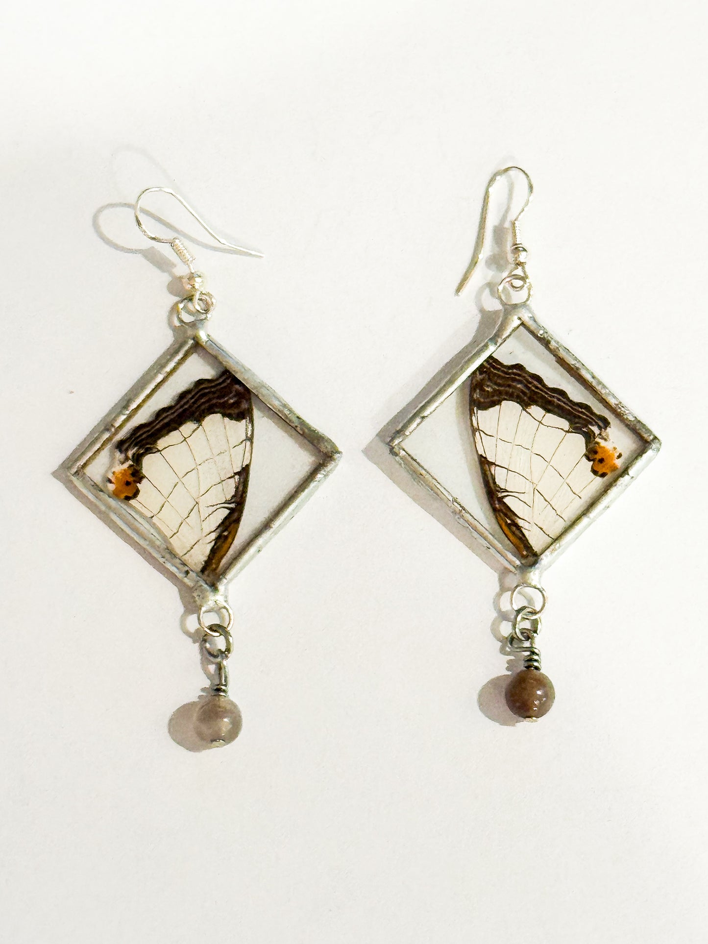 Map butterfly earrings with bead